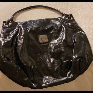 Vera Wang black faux leather hobo style purse.